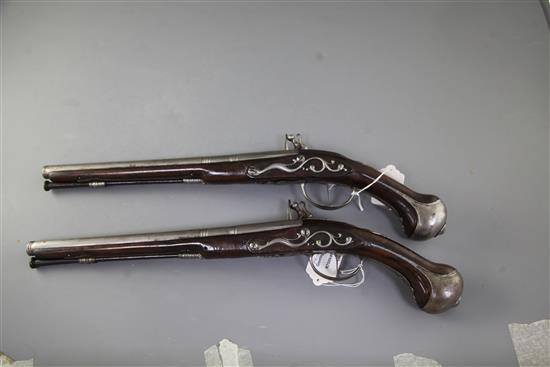 A pair of 20 bore Flemish flintlock holster pistols by C. Chaplot A. Adelshein, late 17th century, 12.75in. barrels, overall 20in.